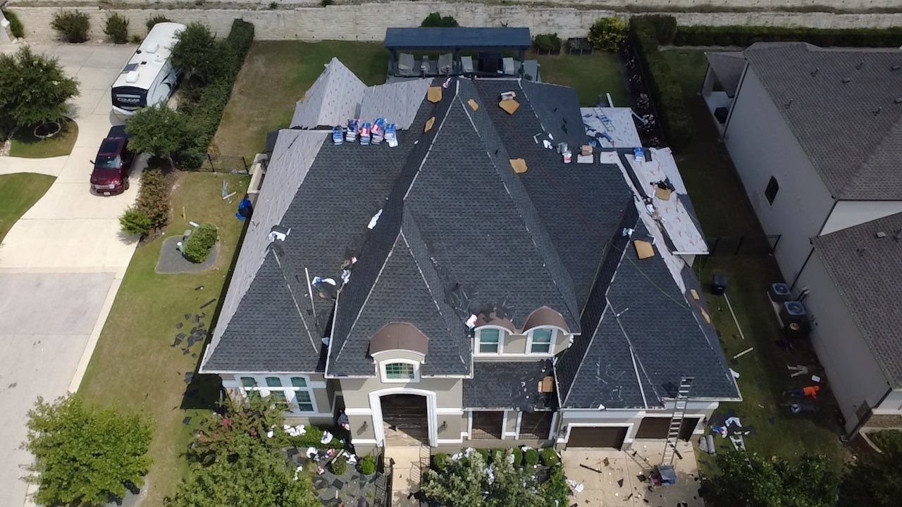 Acacia Roofing team at work on a Central Texas roof installation