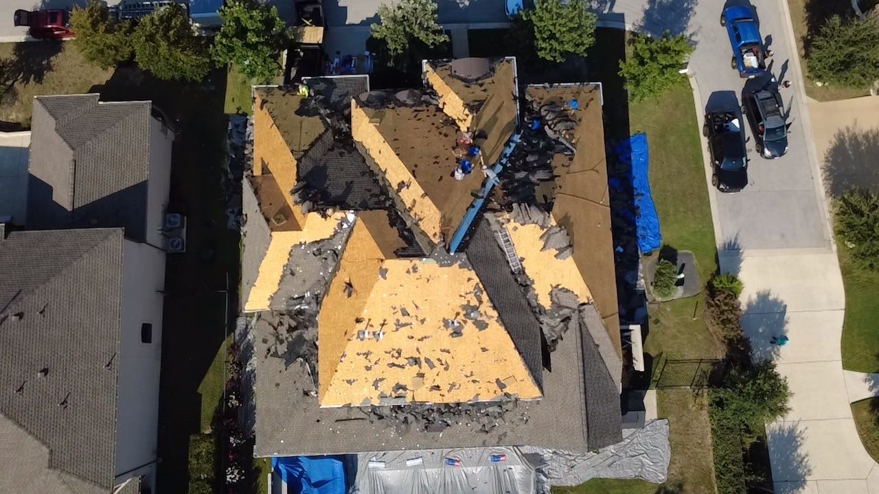 Completed roof replacement aerial view - Acacia Roofing Austin TX